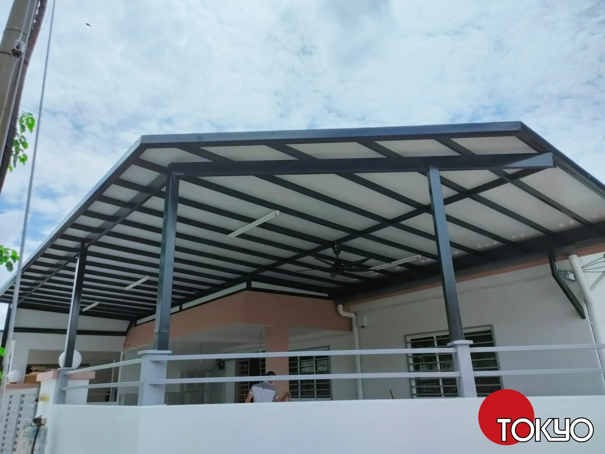 ACP roof awning with printed wood-grain finish over an upstairs balcony — real completed project serving the Bangi area