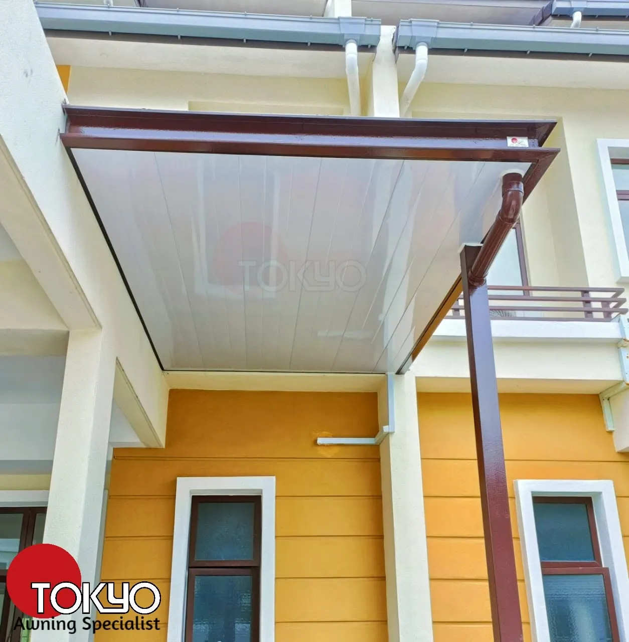 ACP roof awning over a glass sliding door, decorated for Chinese New Year — real completed project serving the Cheras area