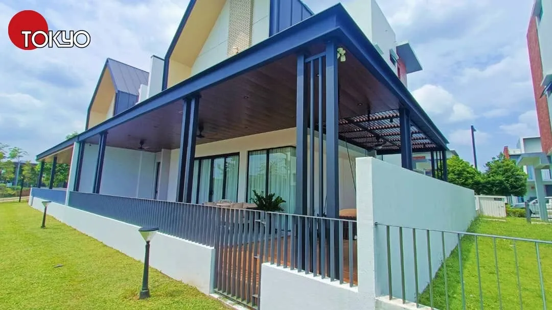 C-roof awning over an open patio at a gable-roofed bungalow — real completed project serving the Kuala Lumpur area