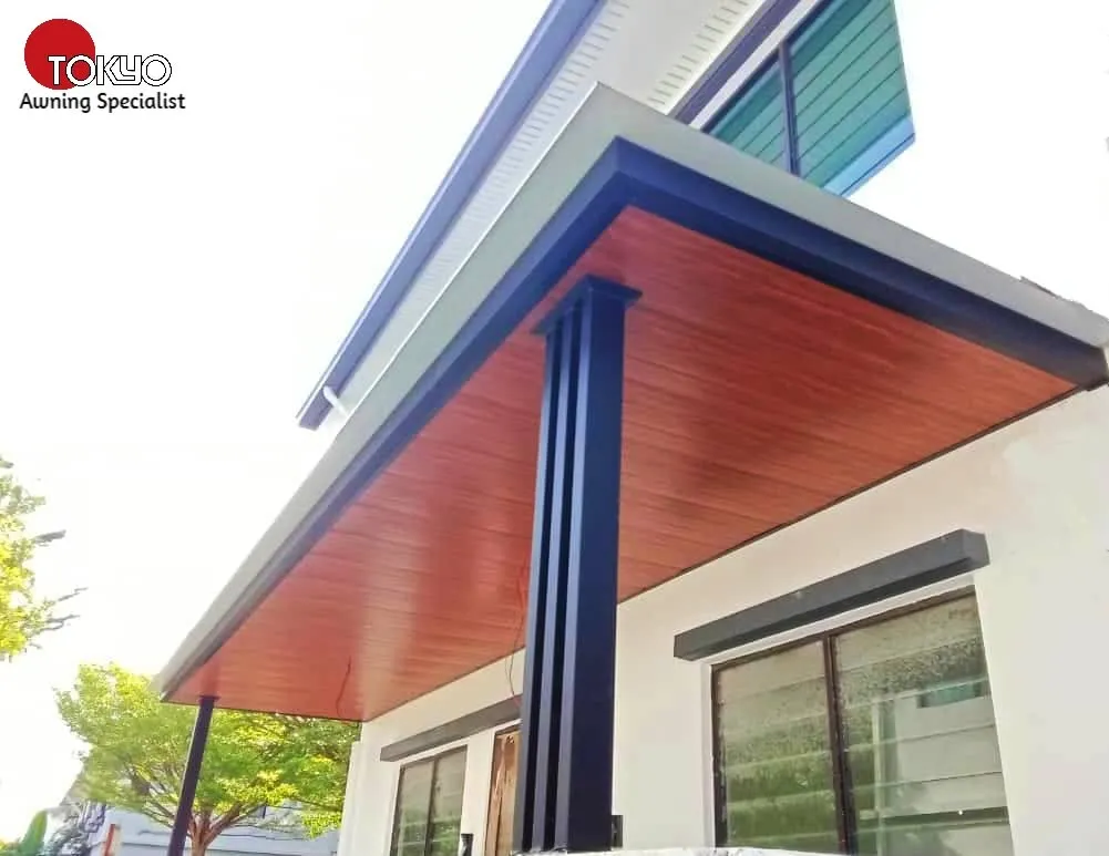 C-roof awning over a car porch at a double-storey house — real completed project serving the Puchong area