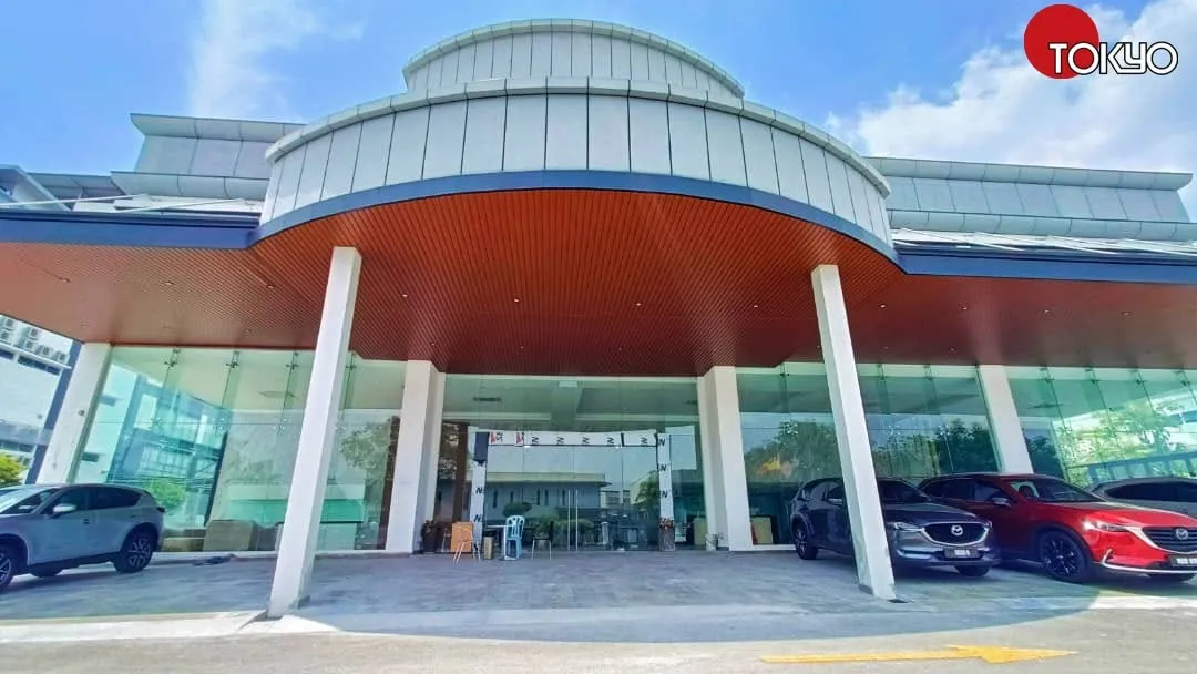 Large commercial canopy over a car showroom entrance — real completed project serving the Puchong area