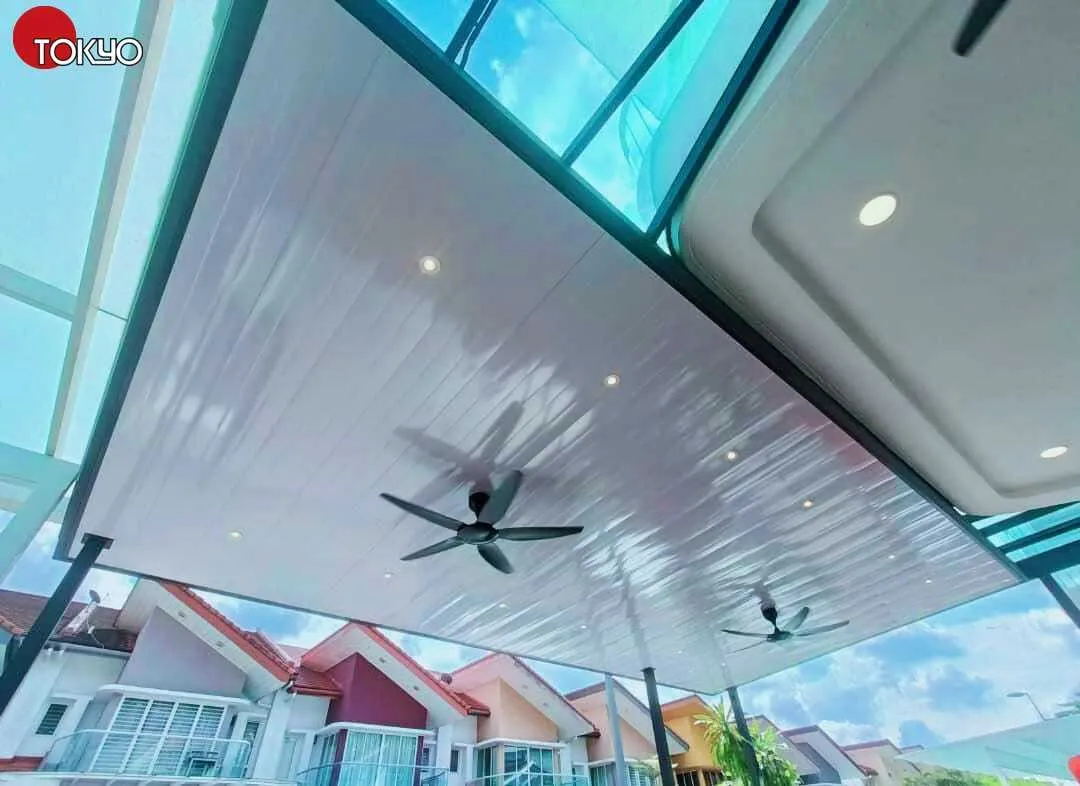 Metal PU sandwich panel roof with a glass skylight strip over a poolside lounge — real completed project serving the Putrajaya area