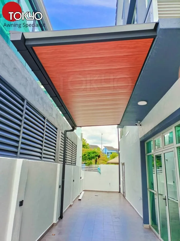 C-roof awning over a side walkway between two houses — real completed project serving the Serdang area