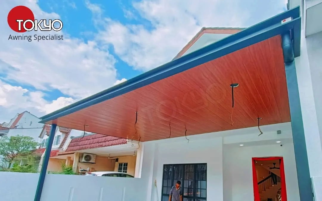 C-roof awning over a car porch at a terrace house — real completed project serving the Serdang area