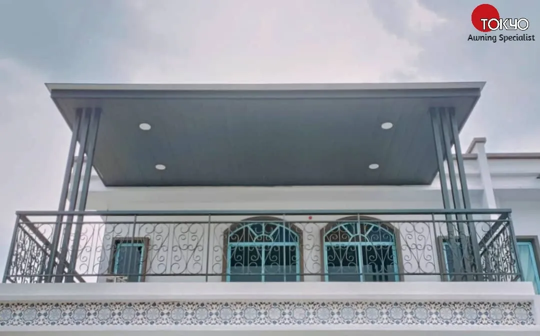 Roof awning over a balcony with an ornate wrought-iron balustrade — real completed project serving the Subang Jaya area